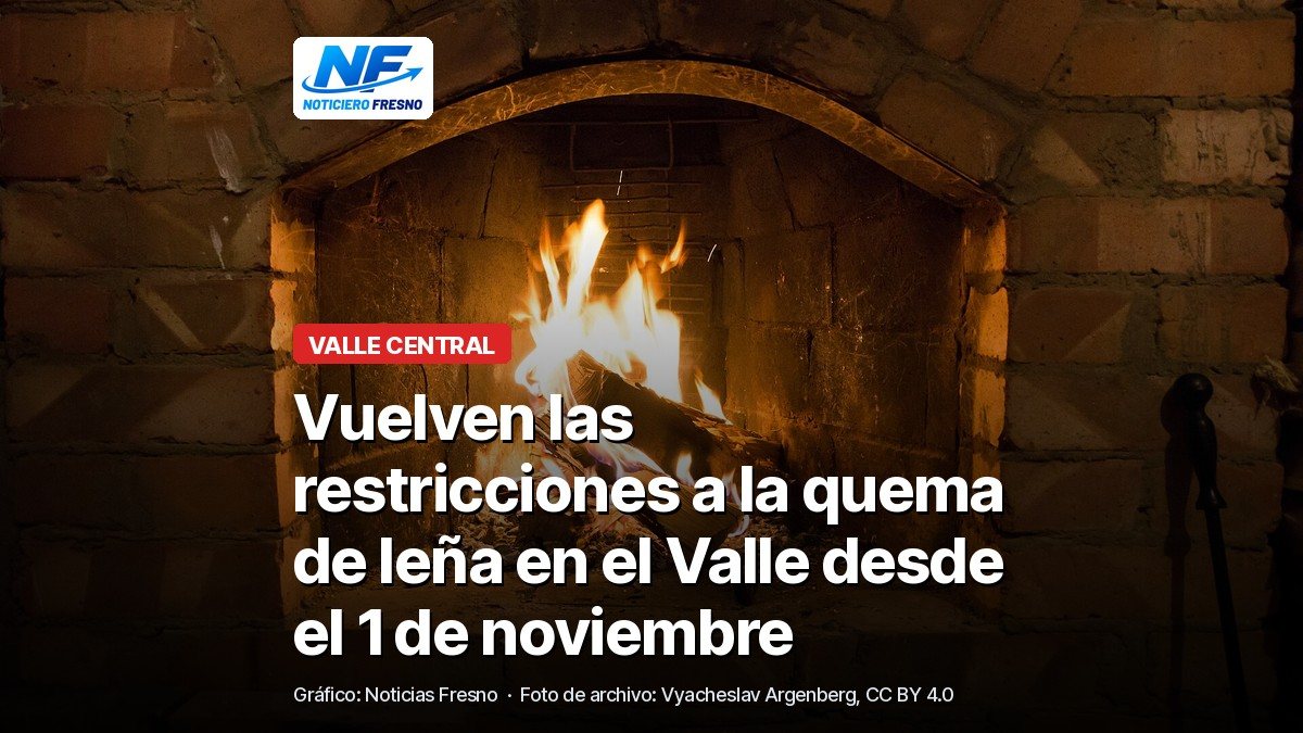 Fuego de leña en una chimenea de ladrillo, foto de archivo, con el titular de la nota